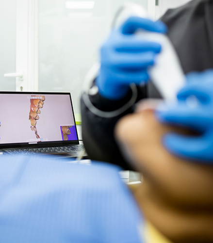 Dental patient having digital impressions of their teeth taken